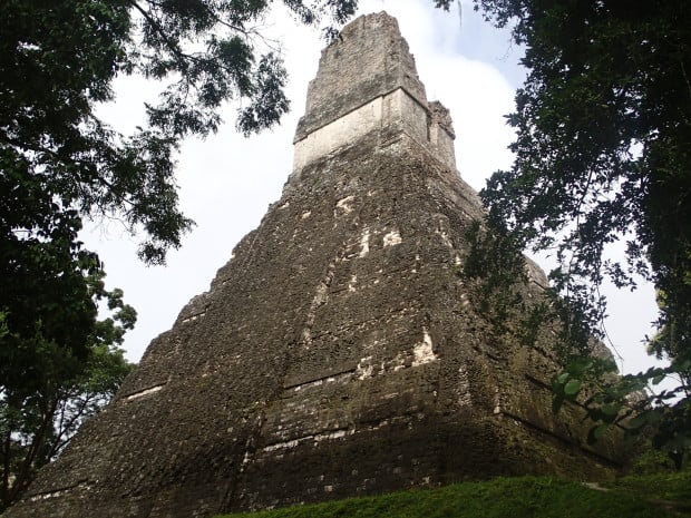 Tikal Temple I, as seen through the trees. 